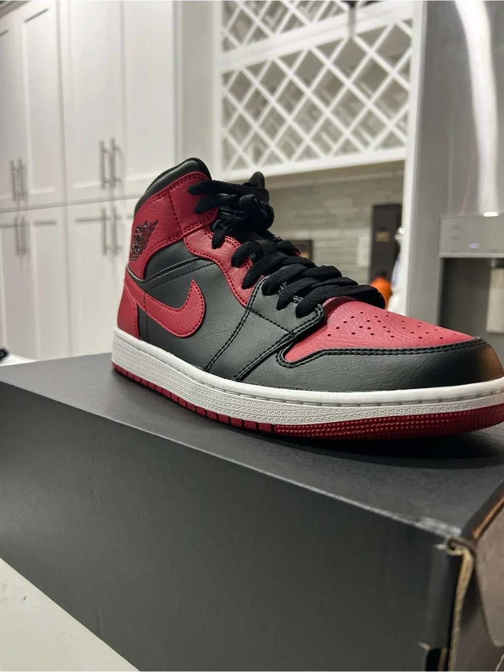 Nike Air Jordan 1 Mid Black and Red Sneakers